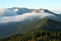 西穂山荘の上から見た焼岳と乗鞍岳の写真にリンク