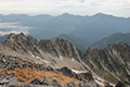 剱岳八ツ峰と後ろ立山連邦の写真にリンク