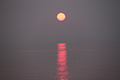 オホーツク海に沈む夕日の写真にリンク